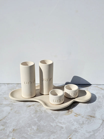 Complete handmade Shabbat set with “Shabbat” and “Shalom” engraved candle holders on sculpted concrete tray in natural finish