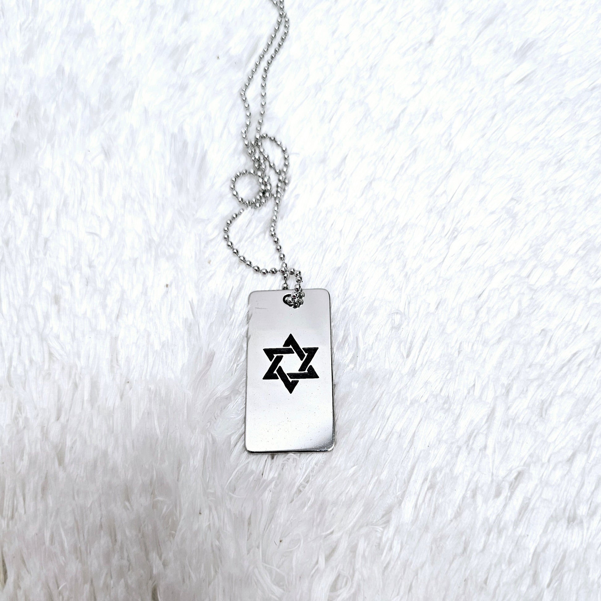 Custom stainless steel disc necklace engraved with Shema Israel's prayer and David Star